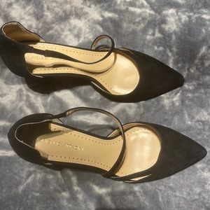 Black suede pumps